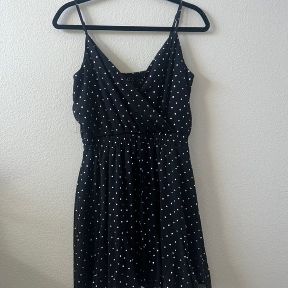 Black mini dress with silver polka dots. Size med NWT